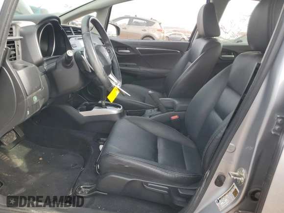 2017 Honda Fit EX-L with VIN JHMGK5H91HS008910, listed as a Copart auction lot 87458324 with 74,745 mi miles and Salvage title. Bid and sale history available at DreamBid. Image 7.