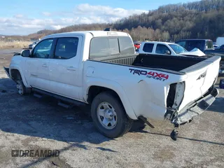 2023 Toyota Tacoma 4WD SR with VIN 3TMCZ5AN1PM538367, listed as a IAAI auction lot 41468684 with 28,879 mi miles. Bid and sale history available at carsss.com. Image 3.