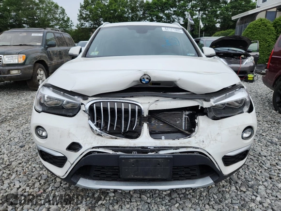 2018 BMW X1 xDrive28i z VIN WBXHT3C36J5L24918, wystawiony jako Copart lot #62171365 z przebiegiem 23 446 mil mil oraz Szkoda całkowita • Salvage title. Historia ofert i sprzedaży dostępna na DreamBid. Obrazek 5.
