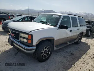1996 GMC Suburban z VIN 1GKFK16R8TJ737658, wystawiony jako Copart lot #52359955 z przebiegiem 203 251 mil mil oraz Szkody całkowita. Historia ofert i sprzedaży dostępna na DreamBid. Obrazek 1.
