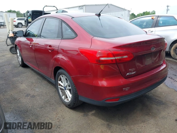 2015 Ford Focus SE with VIN 1FADP3F22FL259223, listed as a IAAI auction lot 42333439 with 77,111 mi miles and . Bid and sale history available at DreamBid. Image 3.