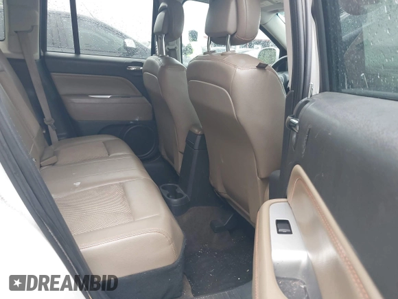 2014 Jeep Compass High Altitude with VIN 1C4NJCEAXED715454, listed as a IAAI auction lot 41960428 with 117,023 mi miles. Bid and sale history available at carsss.com. Image 8.