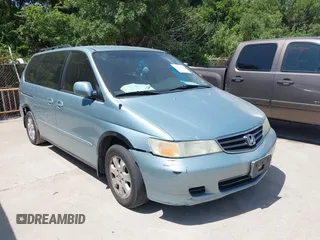 2003 Honda Odyssey EX-L with VIN 5FNRL18913B105370, listed as a IAAI auction lot 42785393 with 203,591 mi miles and . Bid and sale history available at DreamBid. Image 1.
