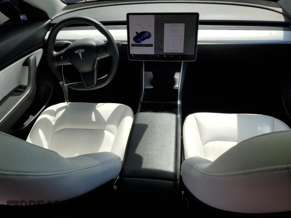 2020 Tesla Model 3 Standard Range Plus z VIN 5YJ3E1EA1LF744069, wystawiony jako Copart lot #53437085 z przebiegiem 121 845 mil mil oraz Szkoda całkowita • Salvage title. Historia ofert i sprzedaży dostępna na DreamBid. Obrazek 8.