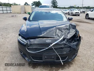2016 Ford Fusion Titanium Hybrid with VIN 3FA6P0RUXGR204106, listed as a Copart auction lot 62769015 with 106,826 mi miles and Salvage title. Bid and sale history available at DreamBid. Image 5.