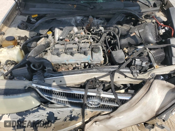 2001 Toyota Solara SE z VIN 2T1FF28P41C475759, wystawiony jako Copart lot #72155284 z przebiegiem Nie podano mil oraz Szkoda całkowita • Salvage title. Historia ofert i sprzedaży dostępna na DreamBid. Obrazek 11.