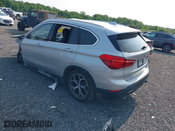 2018 BMW X1 xDrive28i with VIN WBXHT3C32J5K23486, listed as a IAAI auction lot 42387208 with 76,115 mi miles and . Bid and sale history available at DreamBid. Image 3.