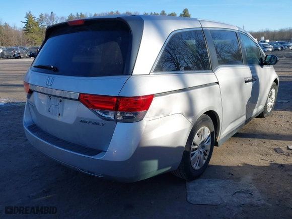 2014 Honda Odyssey LX with VIN 5FNRL5H24EB001131, listed as a IAAI auction lot 41753911 with 238,080 mi miles. Bid and sale history available at carsss.com. Image 4.
