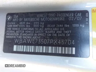 2007 BMW 3 Series 335i with VIN WBAWL73507PX45704, listed as a IAAI auction lot 41752465 with 999,999 mi miles. Bid and sale history available at carsss.com. Image 9.
