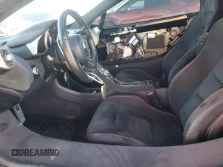 2015 McLaren 650S z VIN SBM11DAA5FW003652, wystawiony jako Copart lot #79296194 z przebiegiem Nie podano mil oraz Szkody całkowita. Historia ofert i sprzedaży dostępna na DreamBid. Obrazek 7.