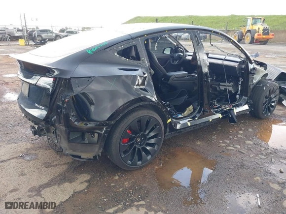 2022 Tesla Model Y Performance with VIN 7SAYGDEF0NF451086, listed as a IAAI auction lot 41793689 with 37,740 mi miles. Bid and sale history available at carsss.com. Image 4.