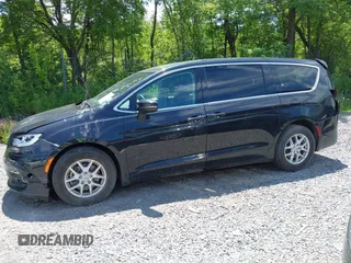 2023 Chrysler Pacifica Touring L with VIN 2C4RC1BG2PR534194, listed as a IAAI auction lot 42613934 with 69,896 mi miles and . Bid and sale history available at DreamBid. Image 14.