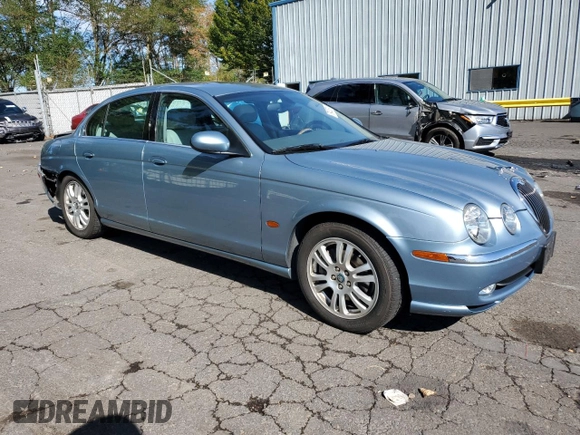 2003 Jaguar S-Type z VIN SAJEA01U53HM73131, wystawiony jako Copart lot #73430914 z przebiegiem 72 730 mil mil oraz Szkody całkowita. Historia ofert i sprzedaży dostępna na DreamBid. Obrazek 4.