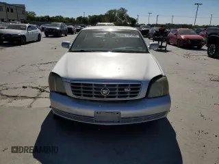 2003 Cadillac DeVille DHS z VIN 1G6KE54Y13U124690, wystawiony jako Copart lot #73757984 z przebiegiem 101 286 mil mil oraz Szkoda całkowita • Salvage title. Historia ofert i sprzedaży dostępna na DreamBid. Obrazek 5.
