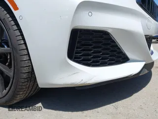 2022 BMW 8 Series M850i z VIN WBAGV8C02NCH87808, wystawiony jako IAAI lot #42255995 z przebiegiem 34 285 mil mil oraz . Historia ofert i sprzedaży dostępna na DreamBid. Obrazek 17.