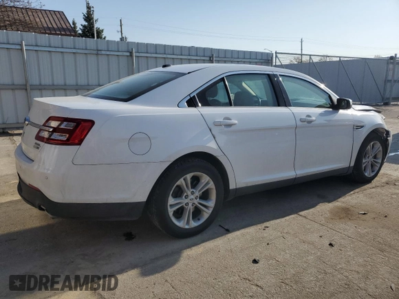 2016 Ford Taurus SEL with VIN 1FAHP2H89GG122884, listed as a Copart auction lot 53597595 with 128,627 mi miles and Salvage title. Bid and sale history available at DreamBid. Image 3.