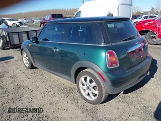 2008 MINI Hardtop with VIN WMWMF33518TT64881, listed as a IAAI auction lot 41692875 with 152,380 mi miles and . Bid and sale history available at DreamBid. Image 3.