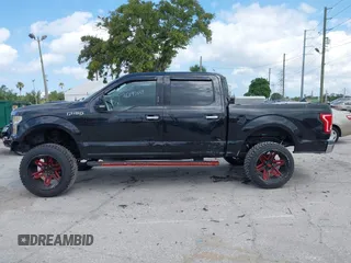 2015 Ford F-150 XLT with VIN 1FTEW1C81FFB05261, listed as a IAAI auction lot 42193554 with Not Provided miles and . Bid and sale history available at carsss.com. Image 14.