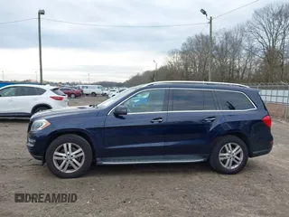 2015 Mercedes-Benz GL-Class GL 450 with VIN 4JGDF6EE9FA513009, listed as a IAAI auction lot 41311164 with 121,185 mi miles. Bid and sale history available at carsss.com. Image 14.