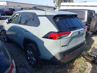 2023 Toyota RAV4 XLE Premium z VIN JTMA1RFV7PJ041609, wystawiony jako IAAI lot #41861931 z przebiegiem 18 862 mil mil oraz . Historia ofert i sprzedaży dostępna na DreamBid. Obrazek 3.