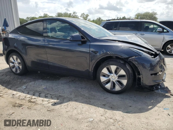 2024 Tesla Model Y Long Range z VIN 7SAYGDEE4RA251337, wystawiony jako Copart lot #59844555 z przebiegiem 16 011 mil mil oraz Szkoda całkowita • Salvage title. Historia ofert i sprzedaży dostępna na DreamBid. Obrazek 4.
