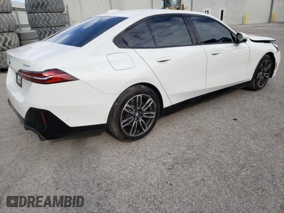 2024 BMW 5 Series 530i with VIN WBA43FJ02RCR63663, listed as a Copart auction lot 86215024 with 3,328 mi miles and Salvage Title. Bid and sale history available at carsss.com. Image 3.