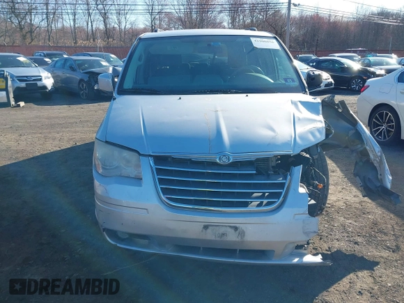 2010 Chrysler Town & Country Touring with VIN 2A4RR5D14AR359169, listed as a IAAI auction lot 41900856 with 204,595 mi miles and . Bid and sale history available at DreamBid. Image 12.