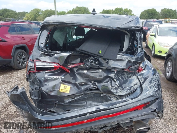 2022 Hyundai Santa Fe SE z VIN 5NMS14AJ9NH429794, wystawiony jako IAAI lot #42370994 z przebiegiem 36 649 mil mil oraz . Historia ofert i sprzedaży dostępna na DreamBid. Obrazek 16.