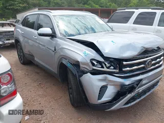 2020 Volkswagen Atlas SE with VIN 1V21E2CA4LC210687, listed as a IAAI auction lot 42382775 with 62,199 mi miles and . Bid and sale history available at DreamBid. Image 1.