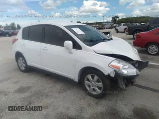 2009 Nissan Versa 1.8 S with VIN 3N1BC13E99L406584, listed as a IAAI auction lot 41687026 with 107,454 mi miles. Bid and sale history available at carsss.com. Image 1.
