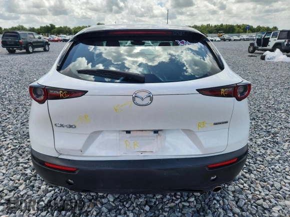 2021 Mazda CX-30 S z VIN 3MVDMAAL9MM212174, wystawiony jako Copart lot #60637625 z przebiegiem 27 575 mil mil oraz Szkoda całkowita • Salvage title. Historia ofert i sprzedaży dostępna na DreamBid. Obrazek 6.