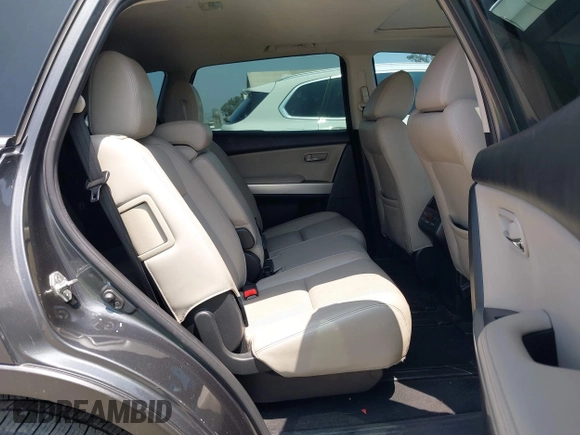 2015 Mazda CX-9 Grand Touring with VIN JM3TB3DA0F0459024, listed as a IAAI auction lot 42452288 with 174,716 mi miles and . Bid and sale history available at DreamBid. Image 8.
