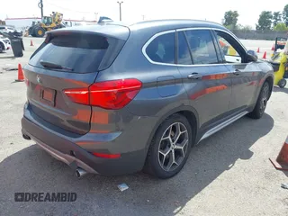 2018 BMW X1 xDrive28i with VIN WBXHT3C30J5L34702, listed as a IAAI auction lot 41935803 with 42,174 mi miles. Bid and sale history available at carsss.com. Image 4.