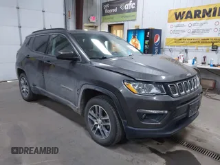 2018 Jeep Compass Altitude with VIN 3C4NJDBB9JT175313, listed as a IAAI auction lot 41661102 with 101,996 mi miles and . Bid and sale history available at DreamBid. Image 1.