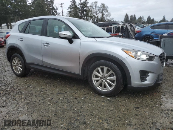 2016 Mazda CX-5 Sport z VIN JM3KE4BY5G0726376, wystawiony jako Copart lot #52009995 z przebiegiem 113 533 mil mil oraz Szkoda całkowita • Salvage title. Historia ofert i sprzedaży dostępna na DreamBid. Obrazek 4.