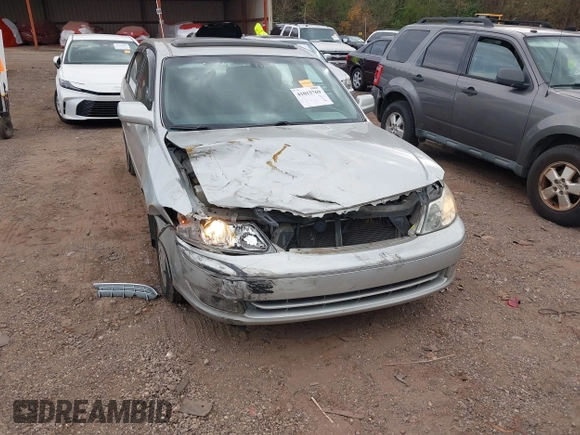 2003 Toyota Avalon XL with VIN 4T1BF28B33U329115, listed as a IAAI auction lot 41015769 with 166,726 mi miles and . Bid and sale history available at carsss.com. Image 6.