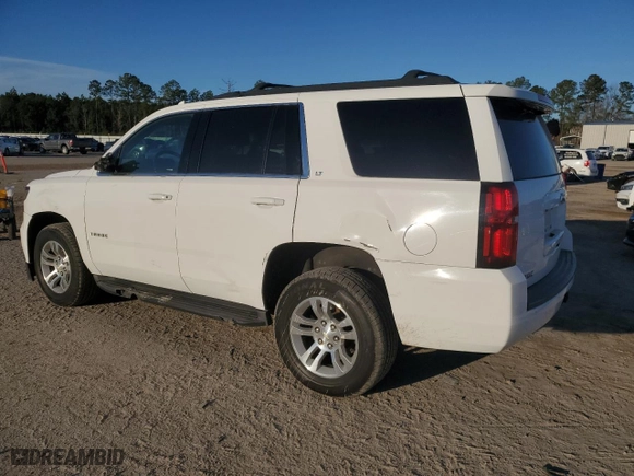 2016 Chevrolet Tahoe LT with VIN 1GNSKBKC0GR258361, listed as a Copart auction lot 42689295 with 136,488 mi miles and Salvage Title. Bid and sale history available at carsss.com. Image 2.