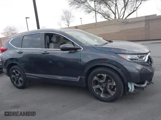 2019 Honda CR-V Touring with VIN 7FARW1H92KE014019, listed as a IAAI auction lot 41691555 with 32,635 mi miles. Bid and sale history available at carsss.com. Image 13.