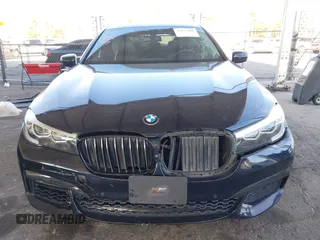 2019 BMW 7 Series 740i with VIN WBA7E2C58KB218419, listed as a IAAI auction lot 41831080 with 97,752 mi miles and . Bid and sale history available at DreamBid. Image 6.