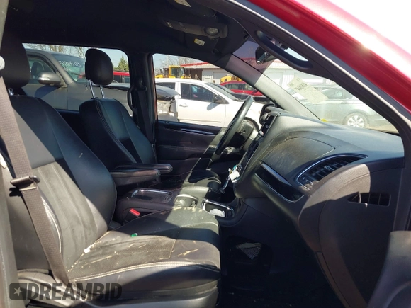 2014 Dodge Grand Caravan SXT with VIN 2C4RDGCG1ER331387, listed as a IAAI auction lot 41810447 with 118,797 mi miles and . Bid and sale history available at DreamBid. Image 5.