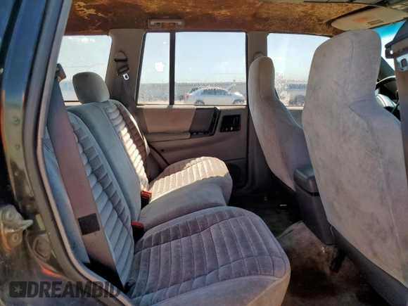 1995 Jeep Grand Cherokee Laredo z VIN 1J4FX58S9SC534442, wystawiony jako Copart lot #61233725 z przebiegiem 363 688 mil mil oraz Szkoda całkowita • Salvage title. Historia ofert i sprzedaży dostępna na DreamBid. Obrazek 11.