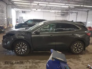 2020 Ford Escape Titanium with VIN 1FMCU9J95LUA39338, listed as a IAAI auction lot 42319122 with 34,631 mi miles and . Bid and sale history available at DreamBid. Image 15.