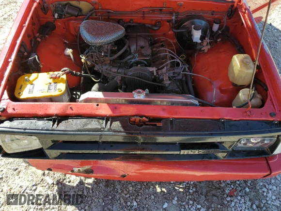 1991 Mazda B-Series Truck z VIN JM2UF3136M0148956, wystawiony jako Copart lot #47346325 z przebiegiem 71 241 mil mil oraz Szkoda całkowita • Salvage title. Historia ofert i sprzedaży dostępna na DreamBid. Obrazek 11.