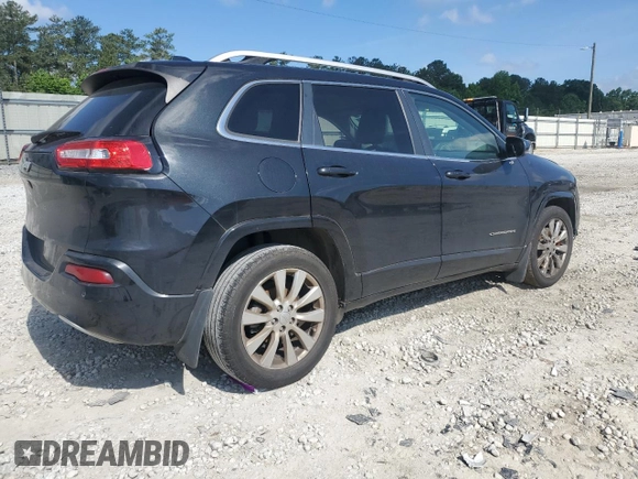 2016 Jeep Cherokee Overland with VIN 1C4PJLJB2GW302605, listed as a Copart auction lot 55143364 with 124,559 mi miles and Salvage title. Bid and sale history available at DreamBid. Image 3.
