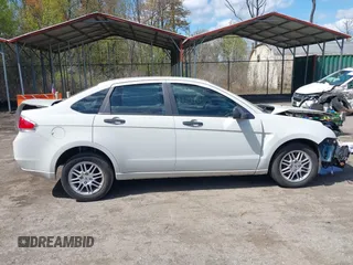 2011 Ford Focus SE with VIN 1FAHP3FN2BW100531, listed as a IAAI auction lot 42006640 with 63,563 mi miles and . Bid and sale history available at DreamBid. Image 13.