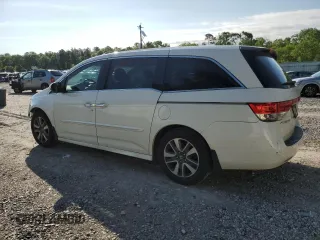2016 Honda Odyssey Touring Elite with VIN 5FNRL5H97GB129217, listed as a Copart auction lot 52177765 with 138,045 mi miles and Salvage Title. Bid and sale history available at DreamBid. Image 2.