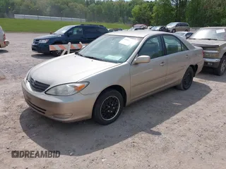 2004 Toyota Camry LE with VIN 4T1BE32K14U846576, listed as a IAAI auction lot 42086537 with 202,027 mi miles. Bid and sale history available at carsss.com. Image 2.