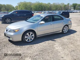 2010 Acura RL Technology with VIN JH4KB2F61AC001845, listed as a Copart auction lot 52549445 with 150,435 mi miles and Salvage Title. Bid and sale history available at DreamBid. Image 1.