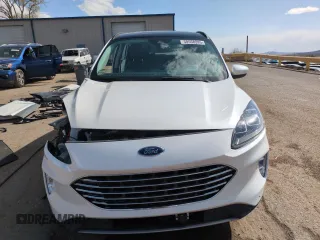 2021 Ford Escape Titanium Hybrid z VIN 1FMCU0DZ2MUB02954, wystawiony jako Copart lot #50558285 z przebiegiem 25 612 mil mil oraz Szkoda całkowita • Salvage title. Historia ofert i sprzedaży dostępna na DreamBid. Obrazek 5.