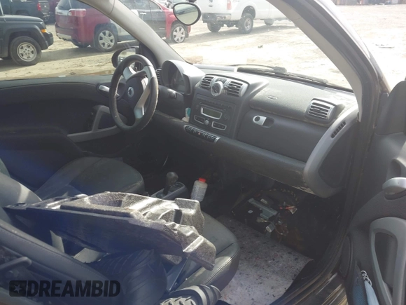 2009 Smart fortwo Passion z VIN WMEEK31X29K288815, wystawiony jako IAAI lot #40953956 z przebiegiem Nie podano mil oraz . Historia ofert i sprzedaży dostępna na DreamBid. Obrazek 5.